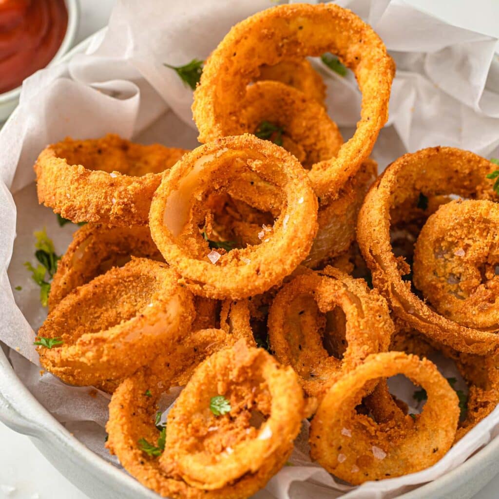 keto onion rings with low carb "breading" in a bowl