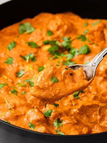 keto chicken tikka masala in a pan and a spoon