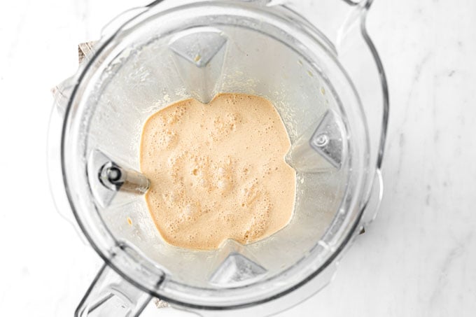 blended smoothie in a blender jug