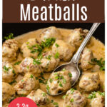 Swedish meatballs in a creamy sauce in a pan with a spoon