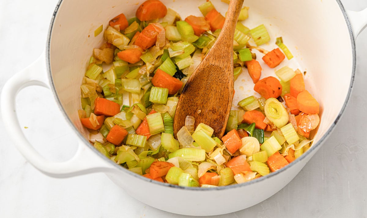 chopped carrots, celery and onions in a pot