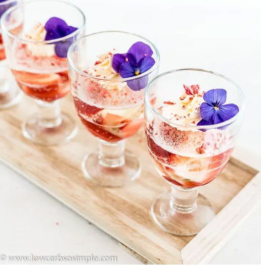 3 glasses with sparkling wine and strawberry jelly
