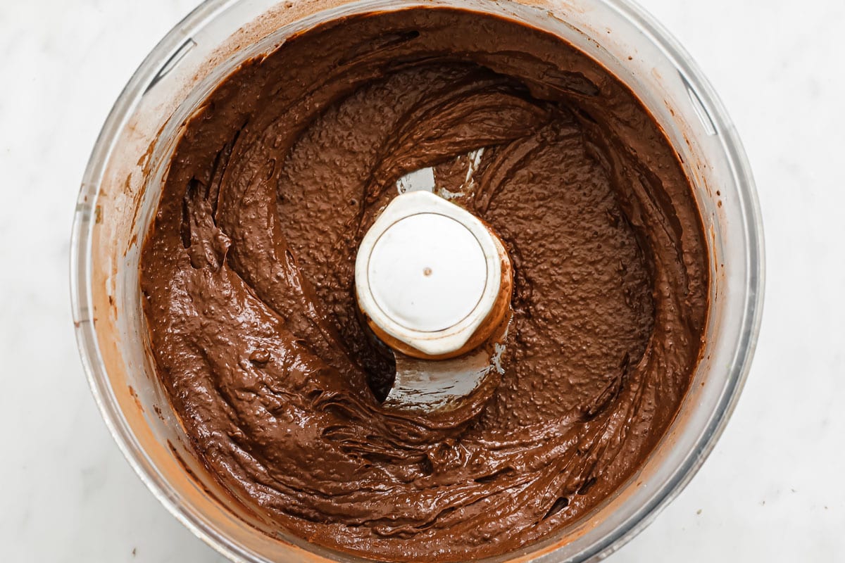 chocolate cookie dough in a food processor bowl