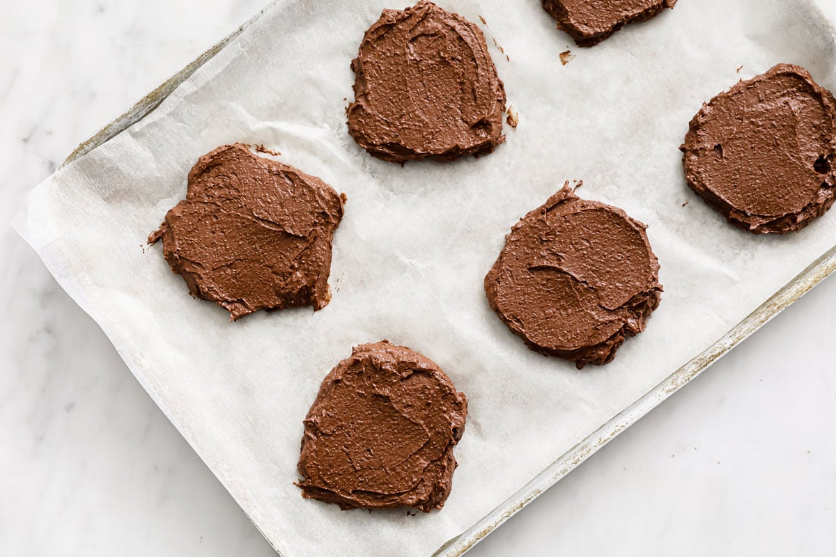 chocolate cookies before baking on parchment paper