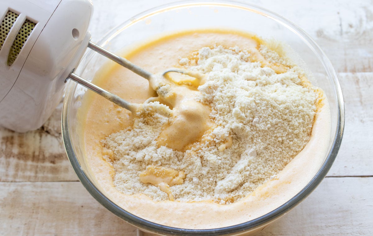 mixing almond flour and coconut flour into the egg mix with a blender