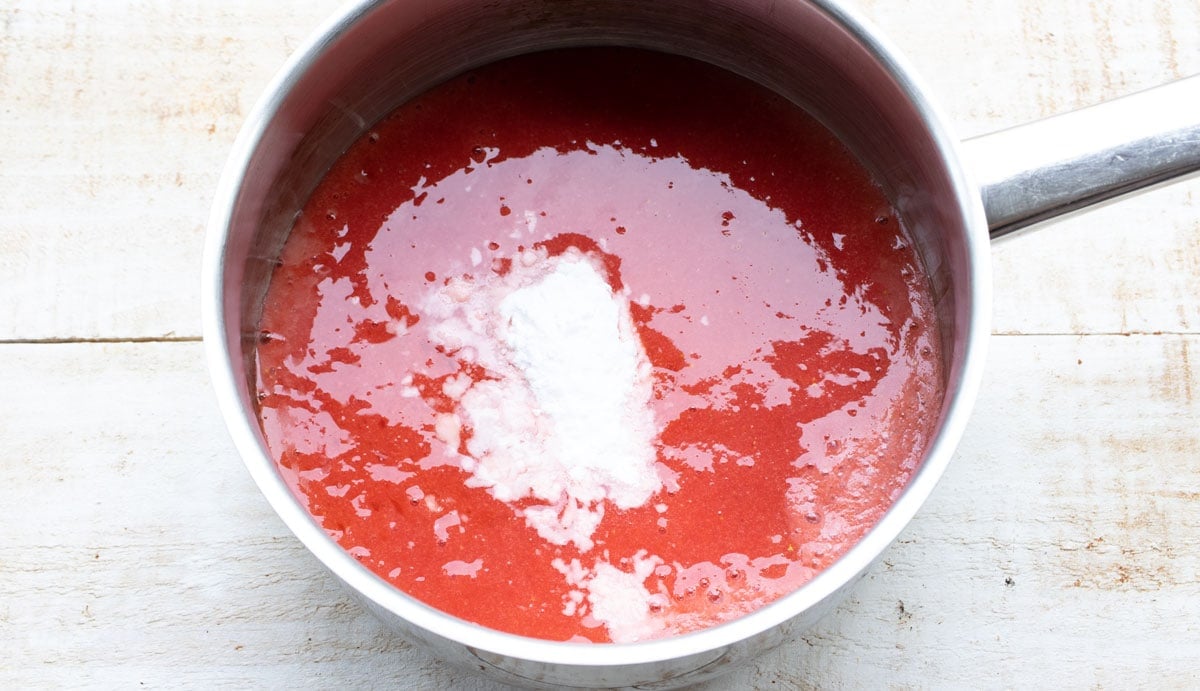 strawberry puree and sweetener in a saucepan