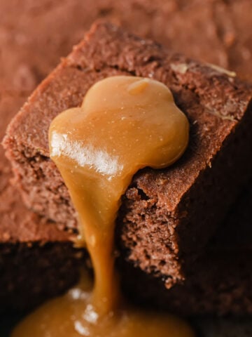 a slice of keto toffee pudding with sugar free caramel sauce