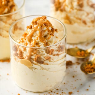 keto peanut butter mousse topped with peanut butter and crumbled sugar free ginger snaps