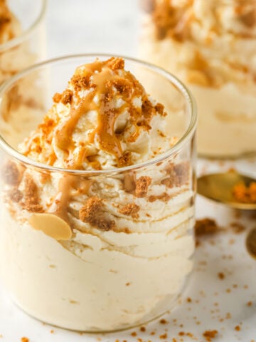 keto peanut butter mousse topped with peanut butter and crumbled sugar free ginger snaps