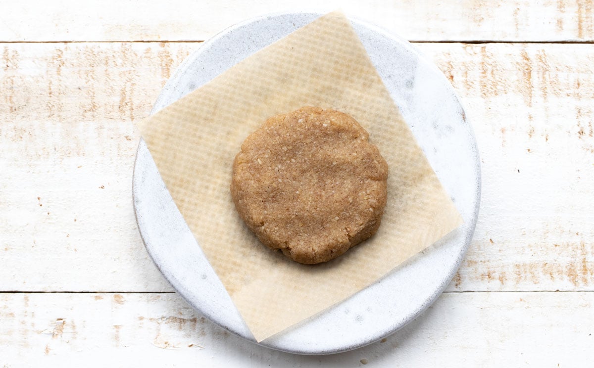 an unbaked cookie on parchment paper