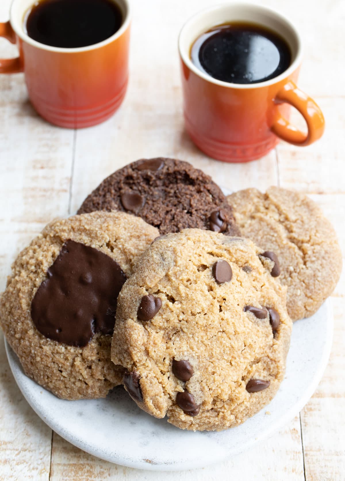 a plate with four cookies