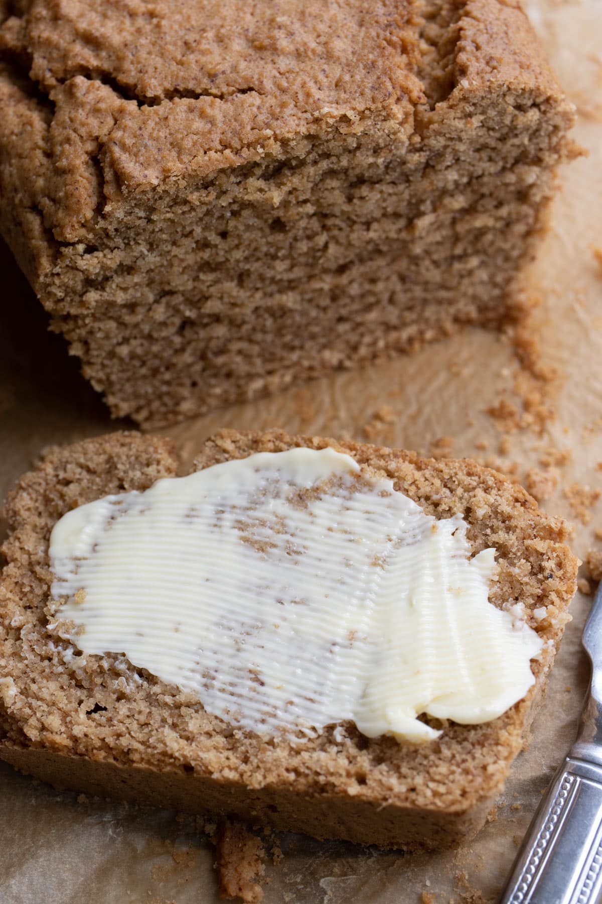 a slice of healthy peanut butter bread with butter