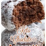 closeup of a bitten into keto chocolate snowball cookie