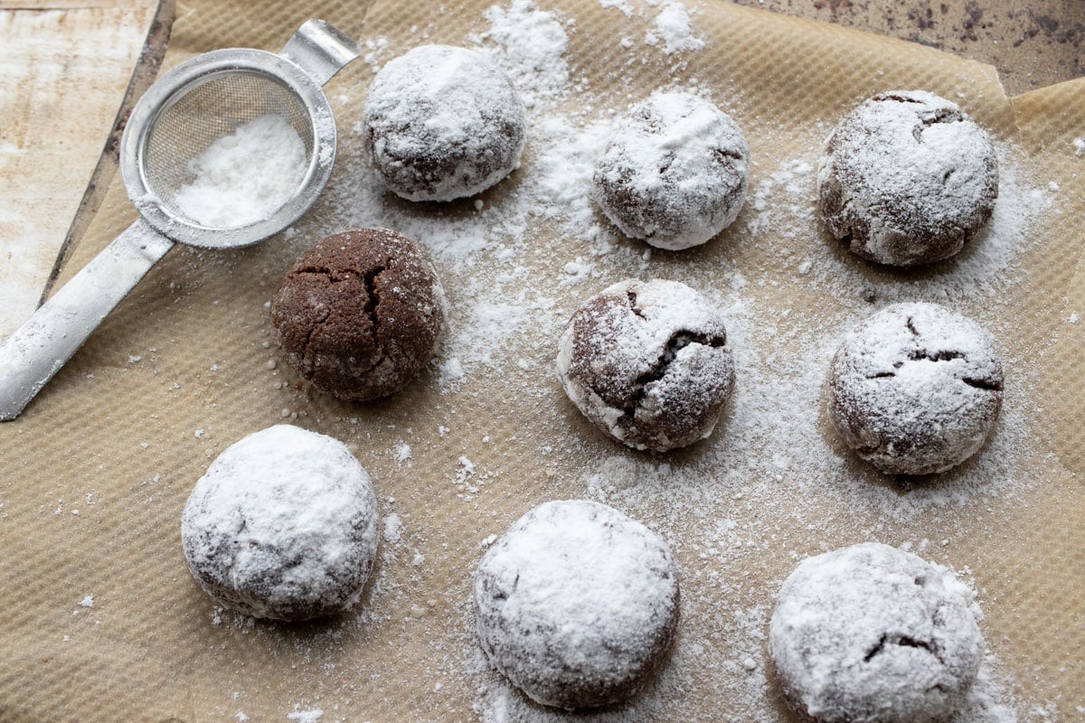 dusting snowball cookies with powdered sweetener
