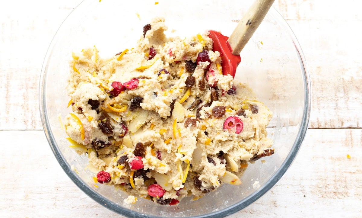 cake dough with dried fruit in a bowl