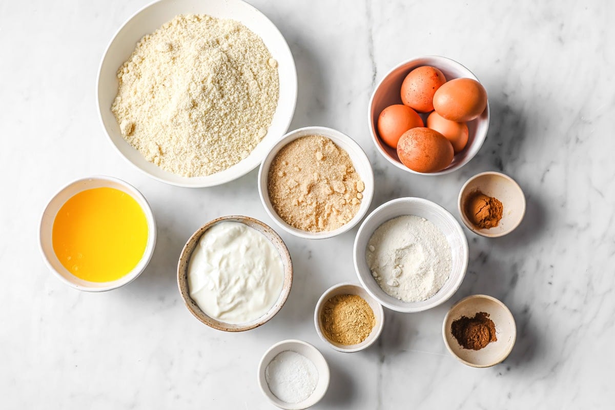 ingredients for this cake recipe measured into bowls