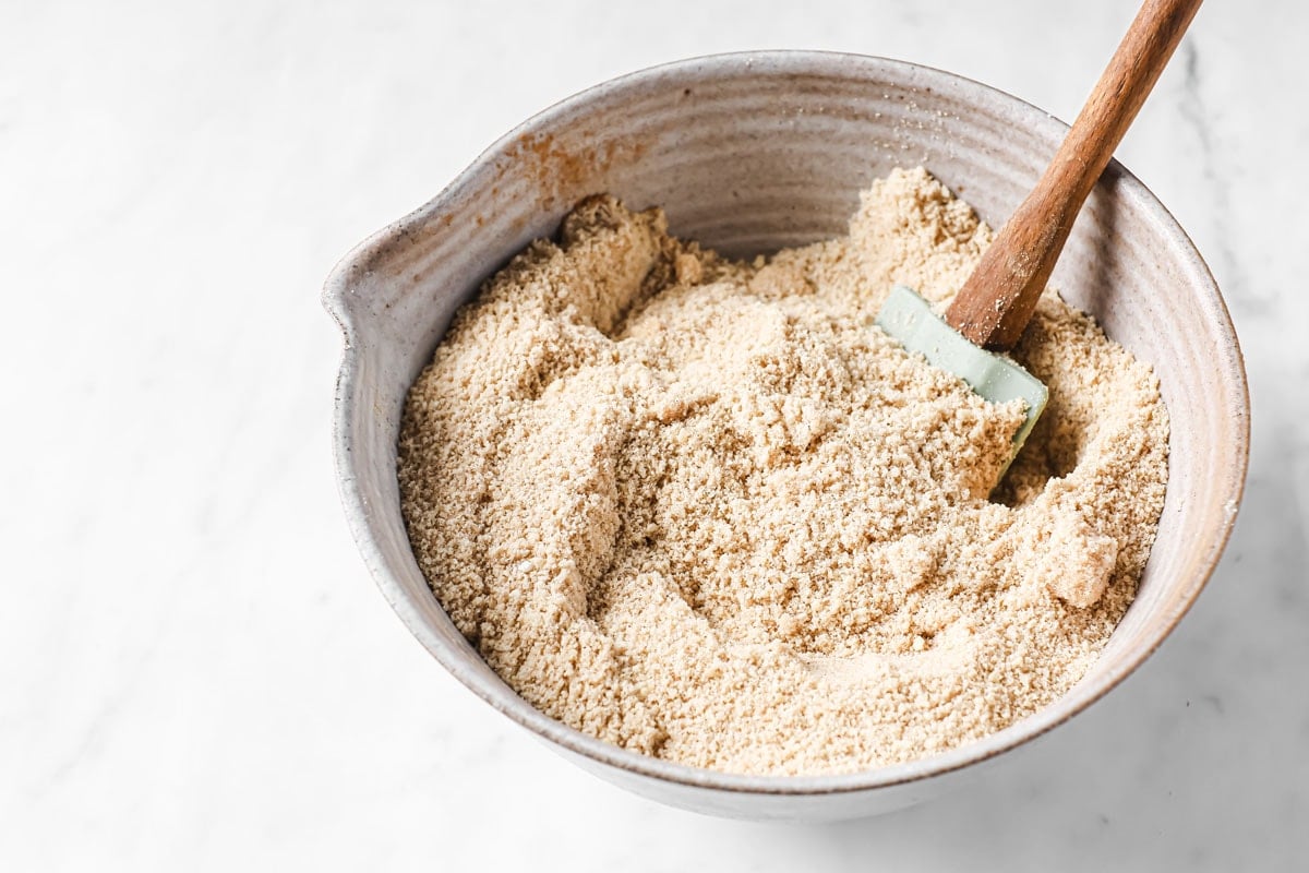 Almond flour and other dry ingredients mixed in a bowl.