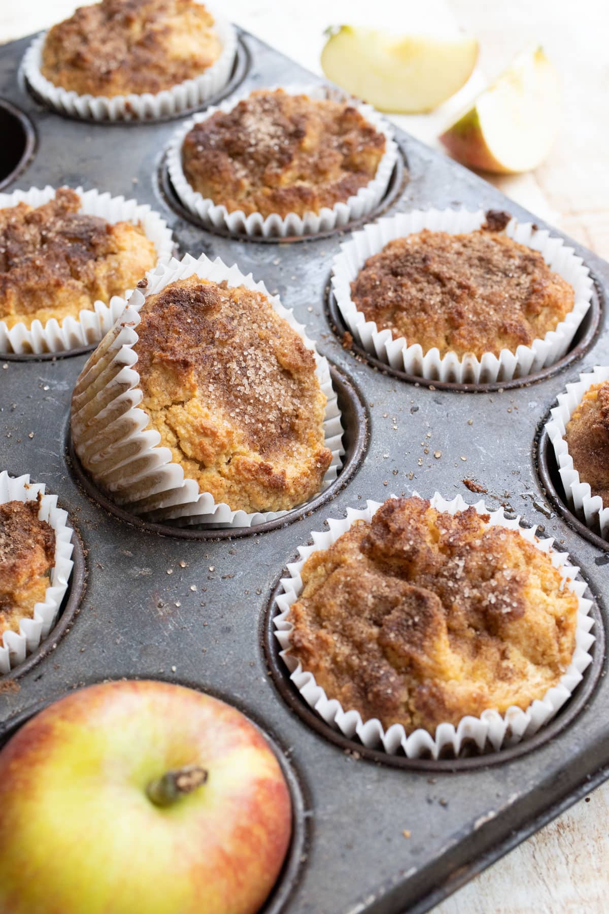 apple muffins in a muffin pan