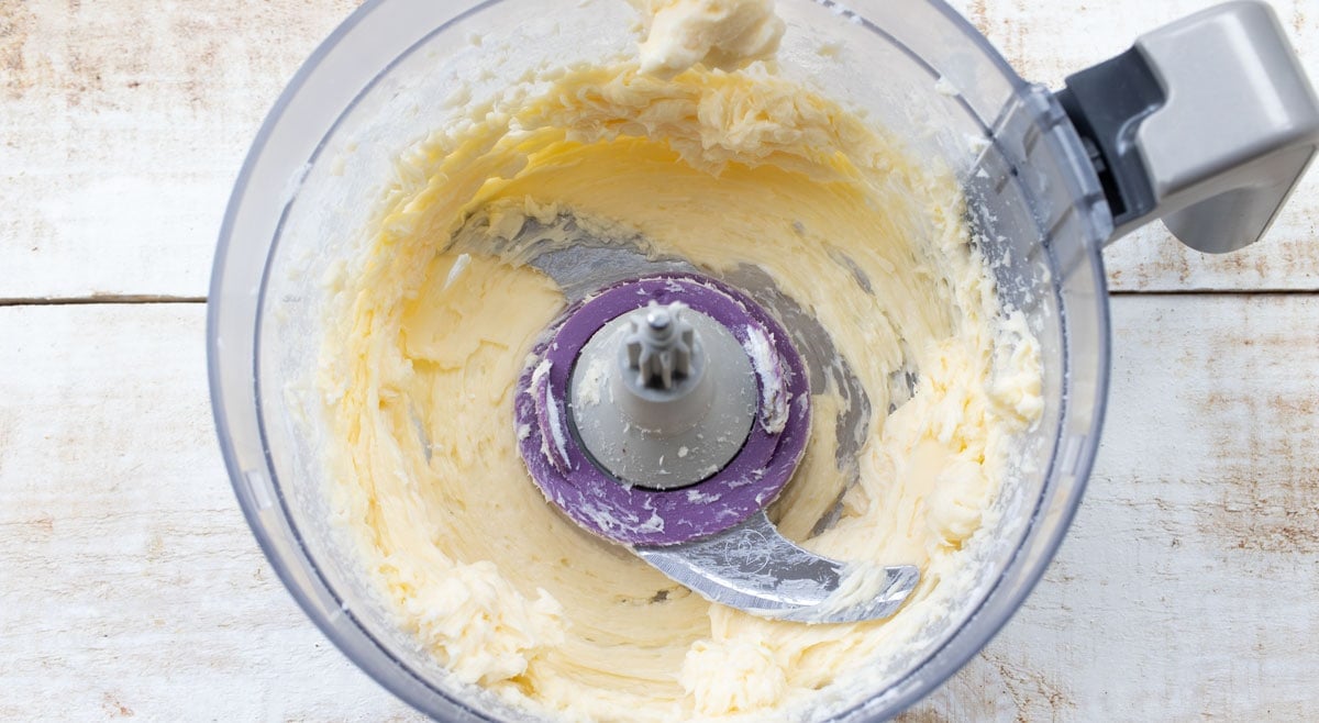 butter and sweetener mix in a food processor bowl