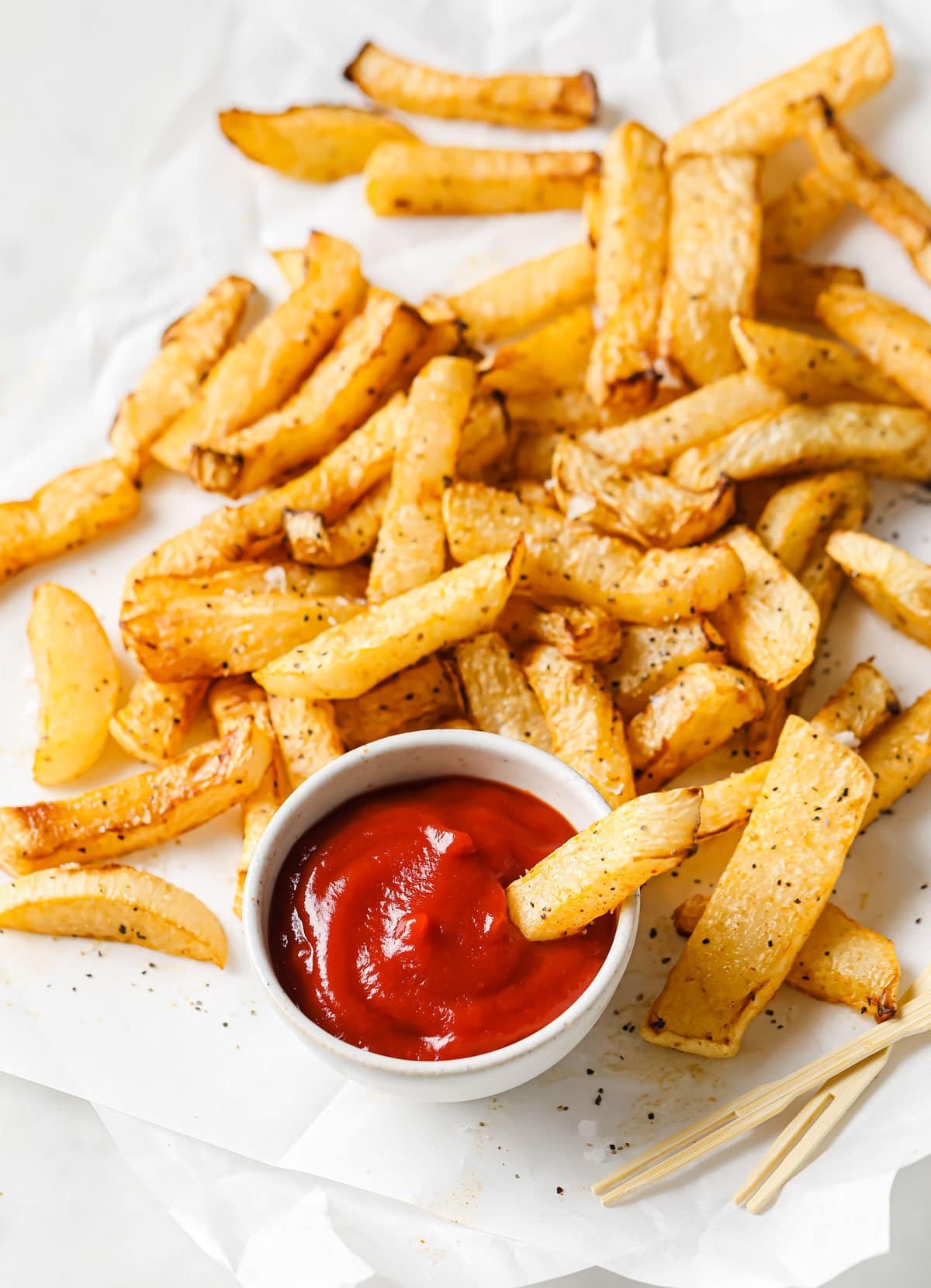 turnip fries and a bowl with ketchup