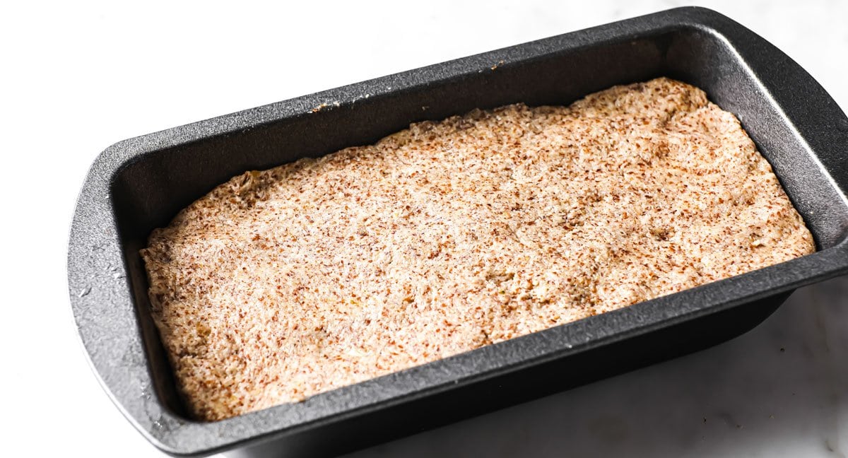 bread dough in a baking pan
