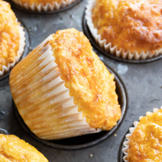 cheddar almond flour muffins in a muffin pan