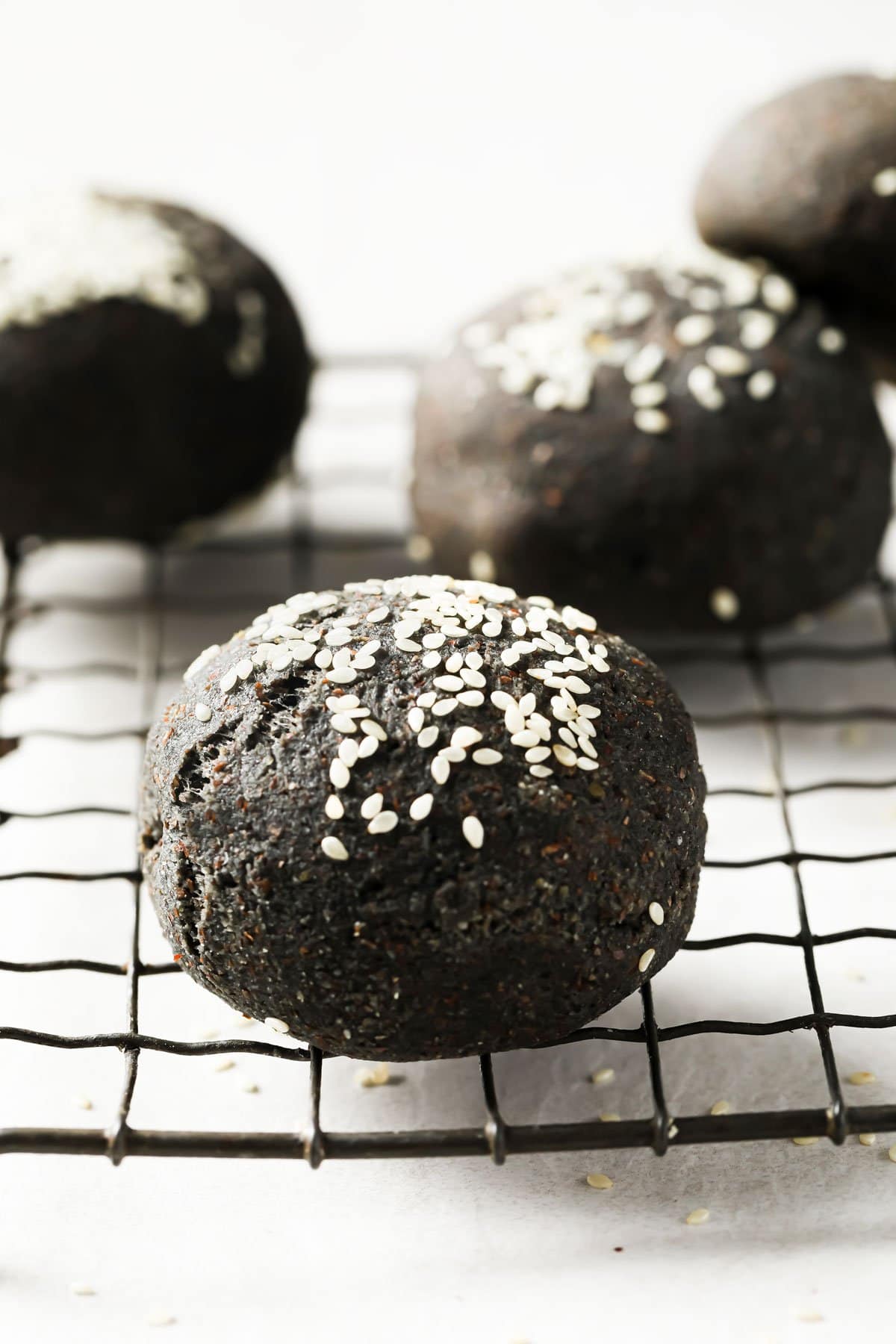 freshly baked buns topped with sesame seeds