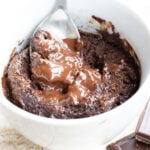 a Keto Chocolate lava cake with a molten chocolate centre and a spoon
