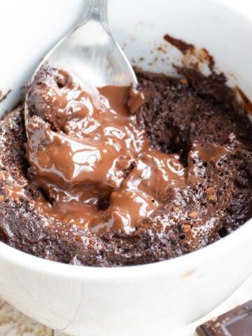 a Keto Chocolate lava cake with a molten chocolate centre and a spoon