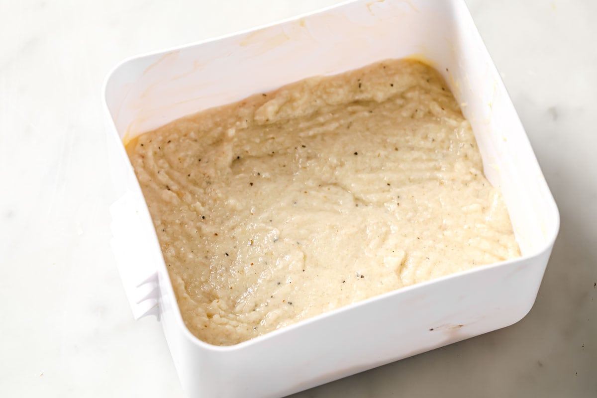 bread dough in a square container