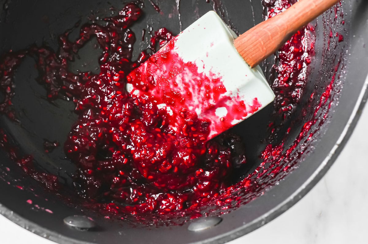 jam in a pan with a spatula