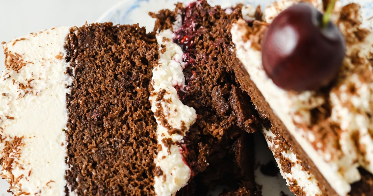 close-up of a slice of black forest cake with cherry