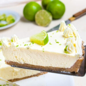 A slice of key lime pie on a serving spatula.