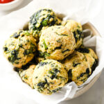 baked spinach balls in a bowl