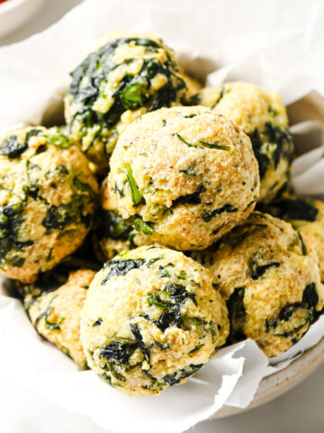 baked spinach balls in a bowl