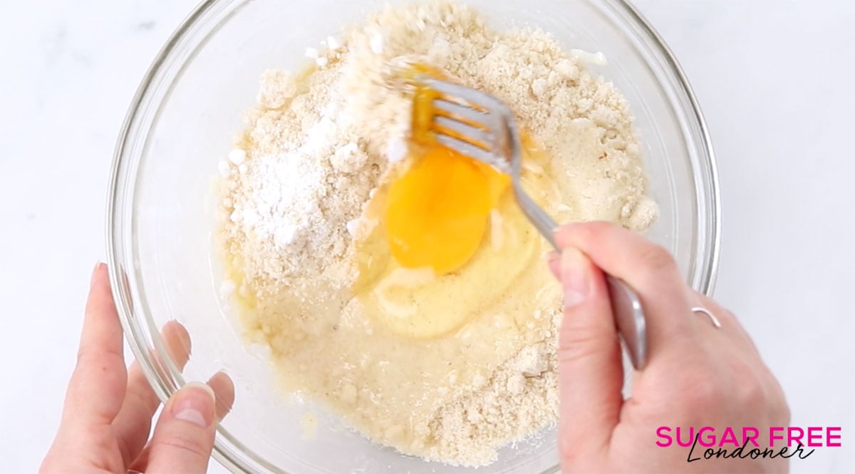 mixing dry ingredients and egg into the melted mozzarella