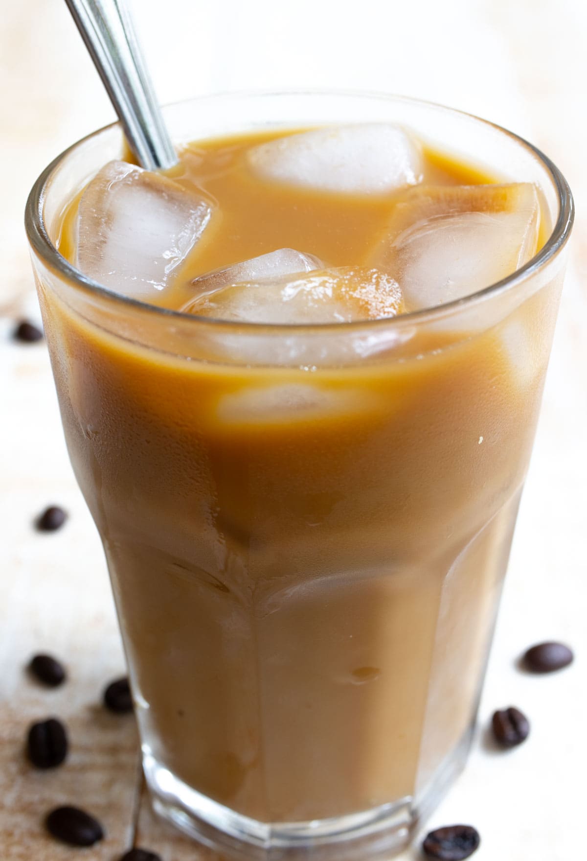 A glass with iced coffee.