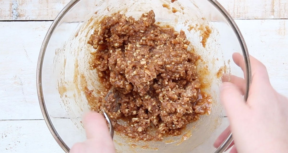 Mixing cookie dough in a bowl with a fork