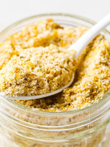 a spoon filled with keto breadcrumbs
