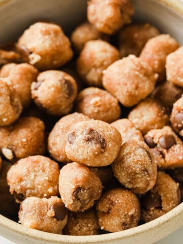 A bowl with keto cookie dough balls.