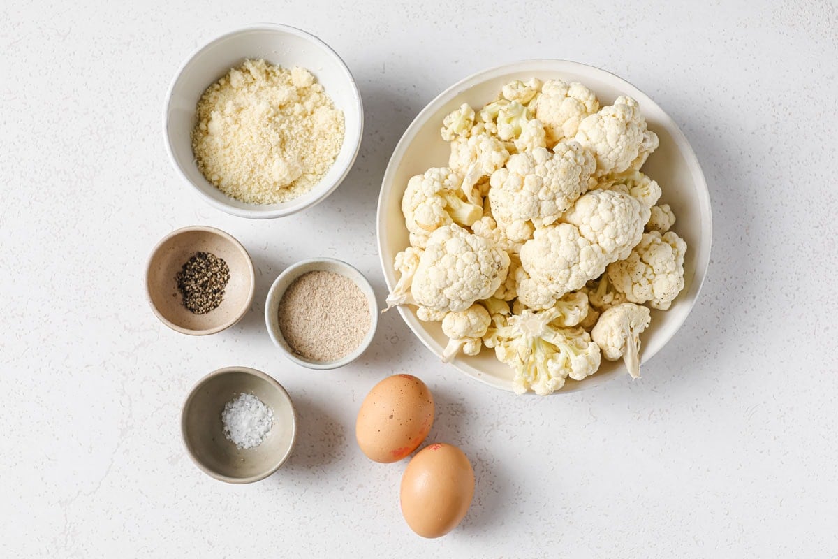 Ingredients to make cauliflower tortillas measured into bowls