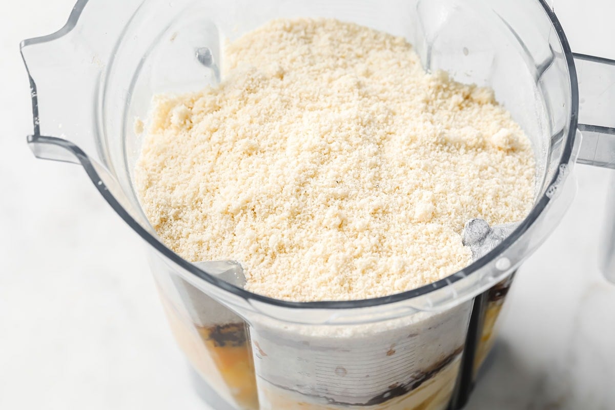 Almond flour and other ingredients in a blender jug