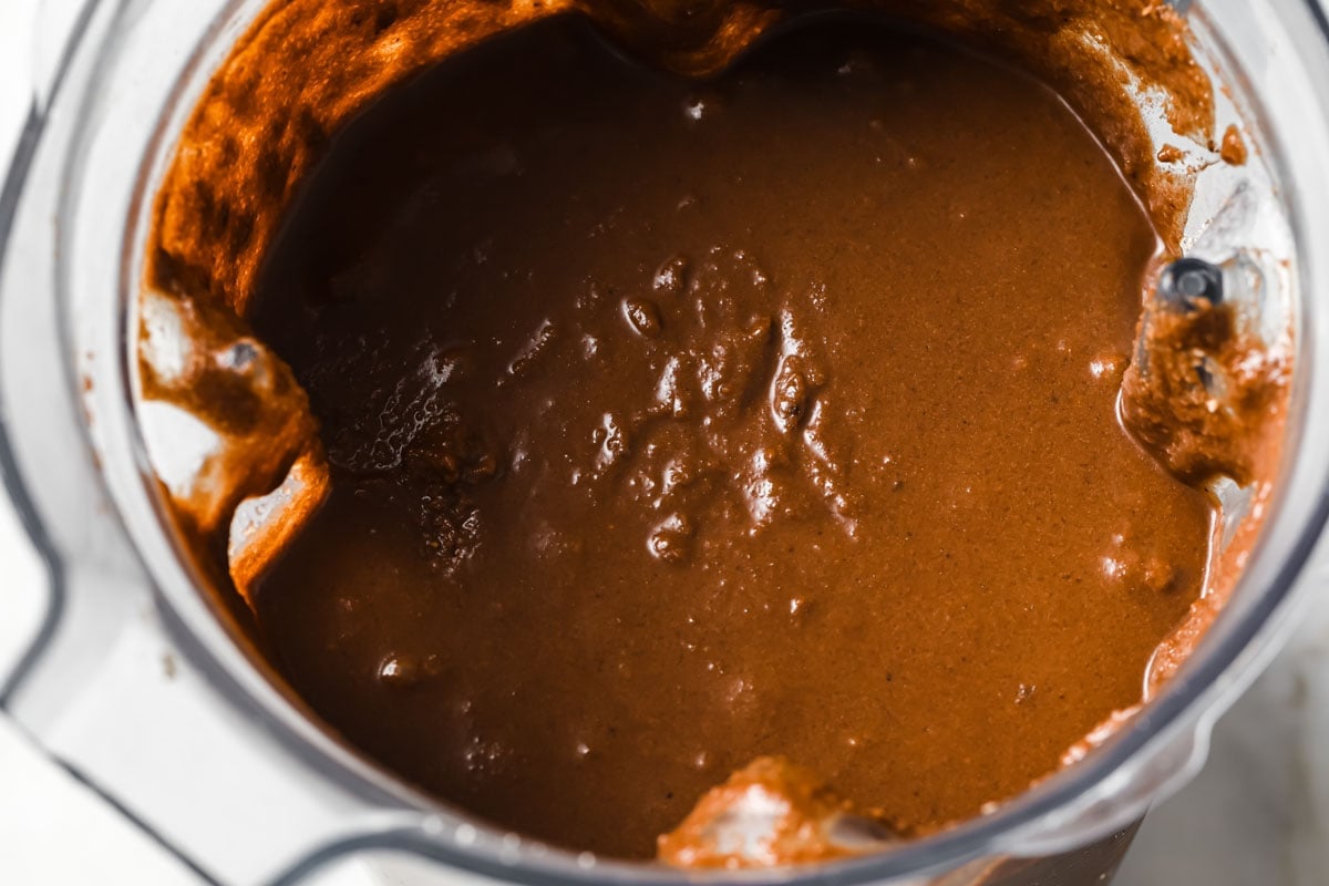 Chocolate cake batter in a food processor bowl