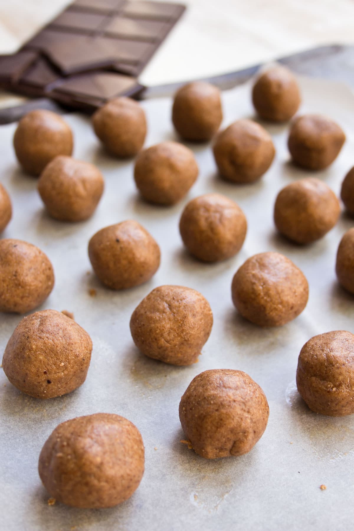 almond butter balls on a sheet or parchment paper.