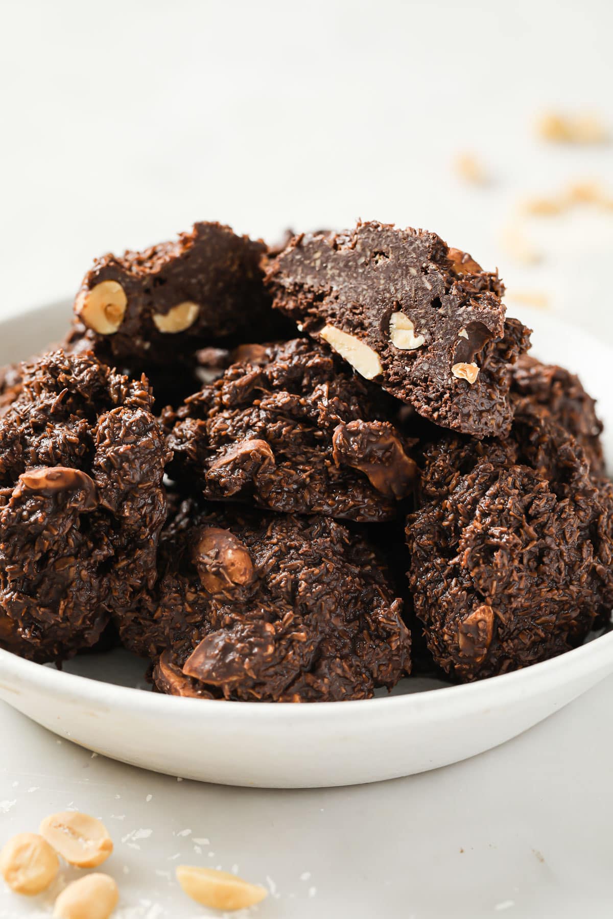 A bowl with coconut haystack cookies.