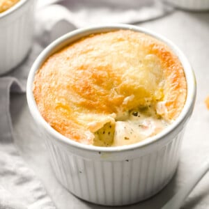 A single serve chicken pot pie in a ramekin.