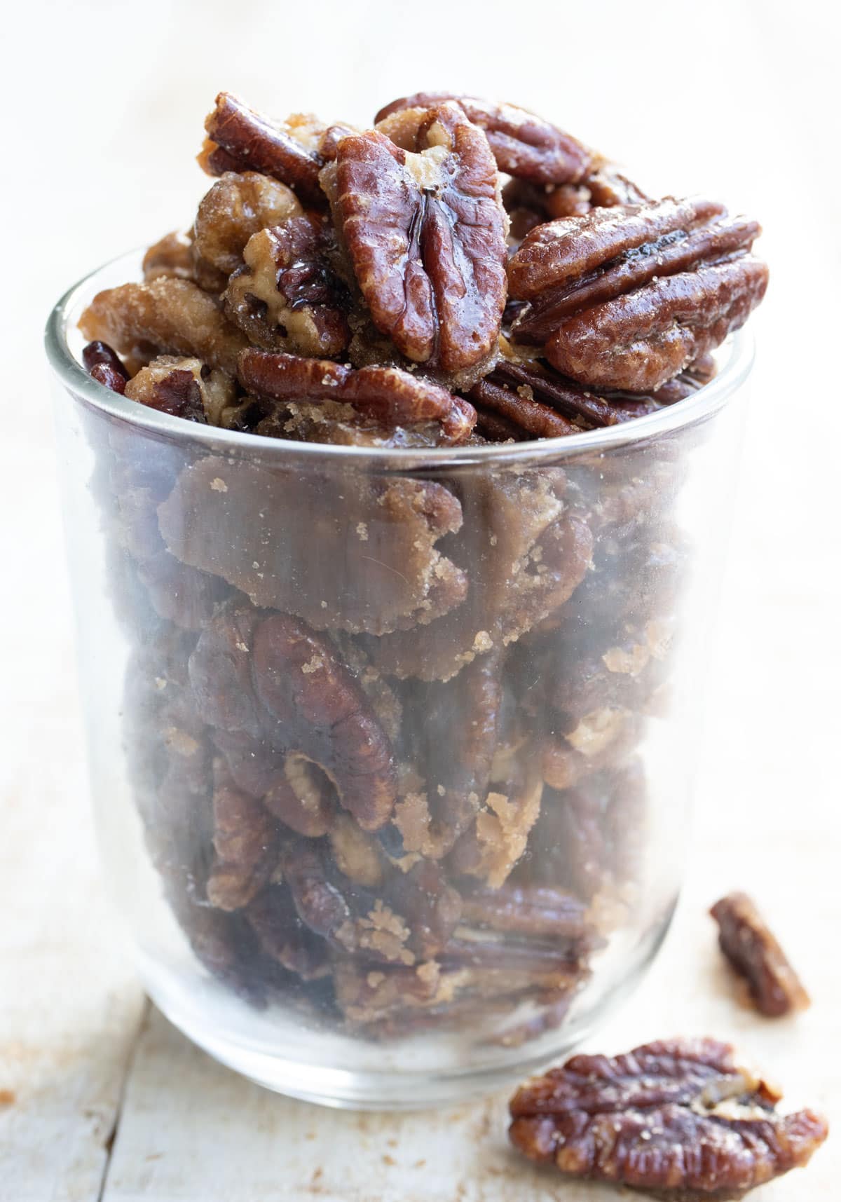 Candied pecans in a glass.