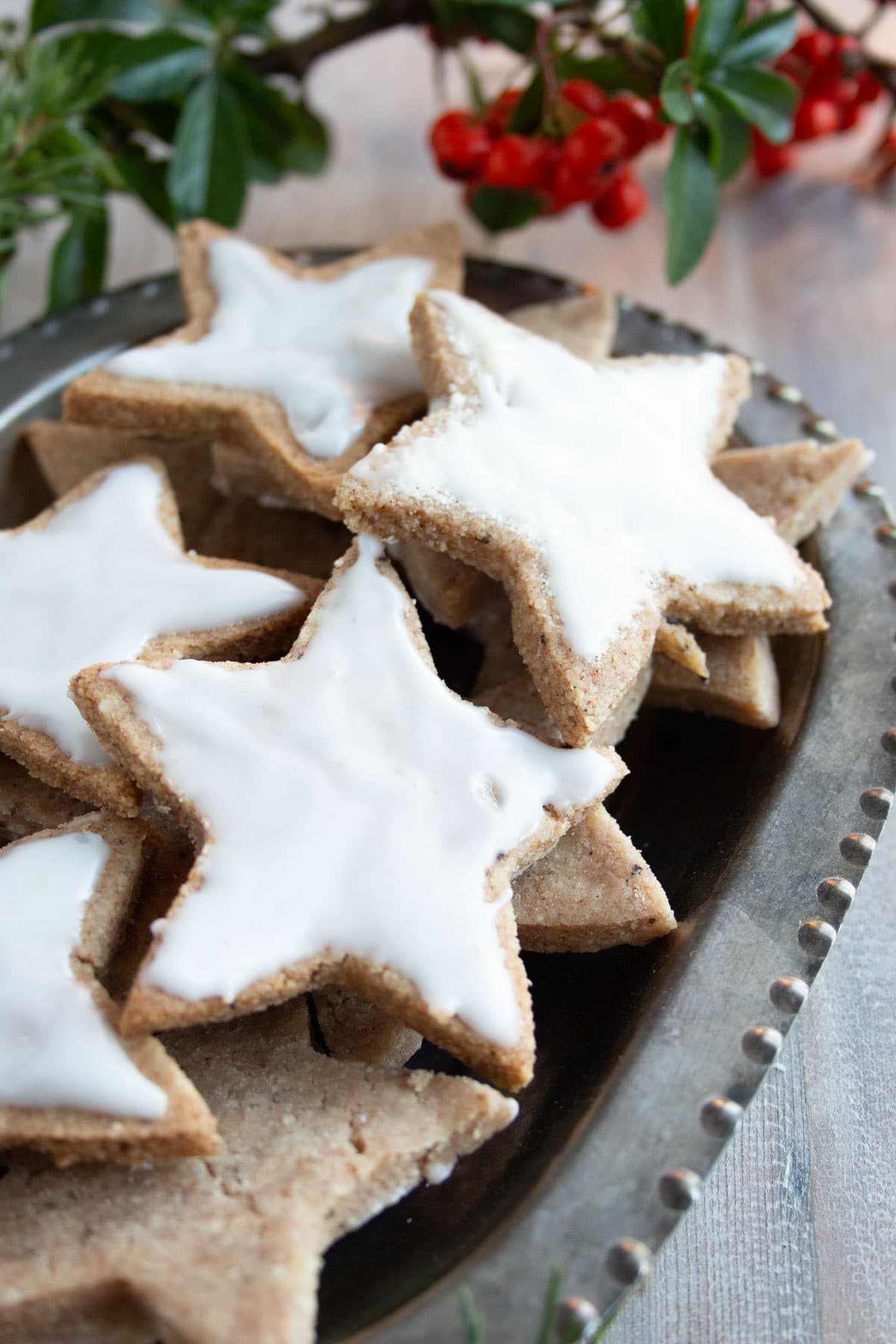 A tray with star shaped cutout cookies.