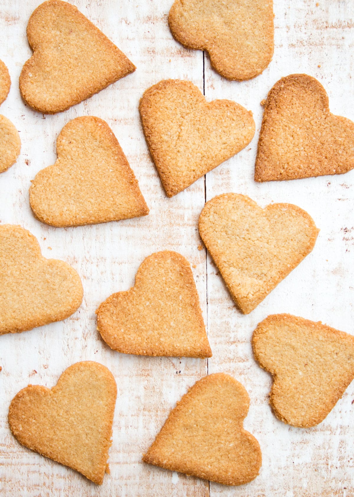 Cookies laid out on a wooden board.