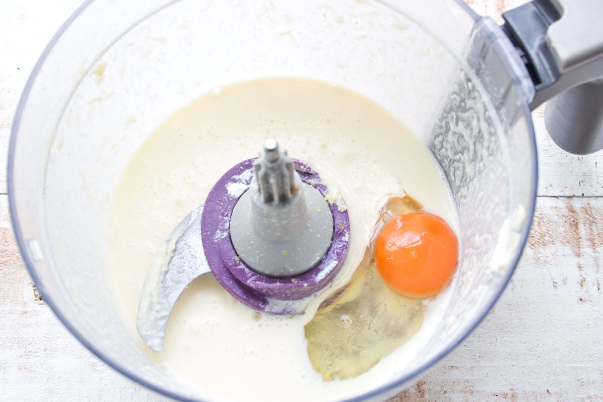 Wet ingredients and egg in a bowl.